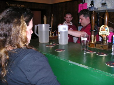 Danielle getting a beer